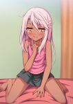  1girl absurdres bare_arms bare_shoulders barefoot bed bed_sheet between_legs black_shorts blush chloe_von_einzbern commentary_request curtains dark-skinned_female dark_skin fate/kaleid_liner_prisma_illya fate_(series) full_body hair_between_eyes hand_between_legs hand_on_own_face highres indoors kneeling long_hair morokoshi_(tekku) on_bed pink_hair pink_shirt second-party_source shirt short_shorts shorts sidelocks sitting solo straight_hair tank_top thighs tongue tongue_out wariza yellow_eyes 