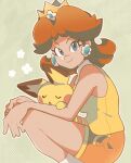  1girl 1other arms_on_knees blue_eyes border breasts brown_hair closed_eyes crossover crown dotted_background earrings eyelashes flower flower_earrings from_side green_background highres jewelry looking_at_viewer loveycloud mario_(series) open_mouth orange_shorts pichu pokemon pokemon_(creature) princess_daisy shirt shorts sleeping sleeping_on_person sleeveless sleeveless_shirt smile socks white_border yellow_shirt 