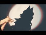  1girl absurdres animal_ears commentary_request from_side hands_up highres hololive hyde_(tabakko) letterboxed ookami_mio shadow_puppet silhouette solo spotlight virtual_youtuber wolf_ears wolf_girl 