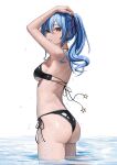  1girl absurdres ass bikini black_bikini blue_eyes blue_hair blush breasts from_behind hair_between_eyes highres hololive hoshimachi_suisei khione_(yukhione) long_hair looking_at_viewer looking_back shiny_skin side_ponytail solo standing star_(symbol) star_in_eye swimsuit symbol_in_eye underboob virtual_youtuber water wet white_background 