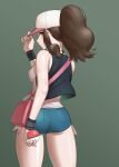  1girl bag baseball_cap black_vest blue_eyes breasts brown_hair commentary from_behind green_background hand_on_headwear hand_up hat high_ponytail highres hilda_(pokemon) holding holding_poke_ball long_hair looking_back open_clothes open_vest pink_bag poke_ball pokemon pokemon_(game) pokemon_bw shiny shiny_skin shirt short_shorts shorts shoulder_bag sidelocks solo sungpark vest white_shirt wristband 
