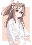  1girl aki_inu alternate_costume bangs blush brown_eyes brown_hair closed_mouth dougi hachimaki hair_between_eyes headband high_ponytail judo kantai_collection long_hair long_sleeves ponytail sidelocks simple_background solo sweat two-tone_background upper_body zuihou_(kancolle) 