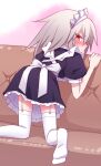  1girl alternate_costume blush commentary couch elena_trafalgar enmaided garter_straps highres ikune_juugo kneeling long_hair looking_back maid maid_headdress no_shoes original puffy_short_sleeves puffy_sleeves red_eyes short_sleeves silver_hair solo thighhighs white_legwear 