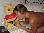  dildo fellatio hetero lowres nude oral penis photo solo strap-on stuffed_animal stuffed_toy what winnie_the_pooh 