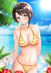  1girl bangs beach bikini black_hair blue_eyes blurry breasts cleavage commentary_request cowboy_shot depth_of_field highres hololive innertube looking_at_viewer medium_breasts mouth_hold oozora_haru oozora_subaru outdoors short_hair solo striped striped_bikini swept_bangs swimsuit virtual_youtuber yellow_bikini 