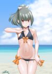  1girl beach bikini bikini_pull black_bikini blue_sky breasts brown_eyes clothes_pull cloud commentary_request cowboy_shot day grey_hair hair_ribbon highres horizon kantai_collection leaning_forward looking_at_viewer medium_breasts ocean outdoors ponytail ribbon side-tie_bikini sky solo swimsuit t2r white_ribbon yuubari_(kancolle) 