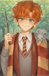  1boy blue_eyes day familiar freckles grey_sweater harry_potter highres holding holding_wand micha mouse necktie orange_hair outdoors red_neckwear ron_weasley scarf school_uniform smile solo striped striped_scarf sweater tree upper_body wand 