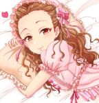  1girl bow brown_eyes brown_hair dress frilled_dress frills heart highres idolmaster idolmaster_cinderella_girls indoors long_hair looking_at_viewer lying mariabowl on_bed on_side pillow pink_bow pink_dress puffy_short_sleeves puffy_sleeves seki_hiromi short_sleeves upper_body wavy_hair 