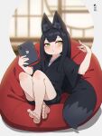  1girl animal_ear_fluff animal_ears bangs barefoot bike_shorts black_hair black_kimono black_shorts blurry blurry_background blush closed_mouth commentary_request depth_of_field eyebrows_visible_through_hair fox_ears fox_girl fox_tail full_body green_eyes hands_up highres holding japanese_clothes kimono kuro_kosyou long_hair looking_at_viewer original short_shorts short_sleeves shorts sitting soles solo tablet_pc tail wide_sleeves yui_(kuro_kosyou) 