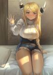  1girl blonde_hair blush breasts denim denim_shorts draph granblue_fantasy highres horn_ornament horn_warmers horns kuvira_(granblue_fantasy) large_breasts long_hair on_bed pepeo pillow pointy_ears ribbed_sweater short_shorts shorts sitting smile solo sweater thighs turtleneck turtleneck_sweater vest waving white_sweater yellow_eyes 