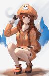  1girl absurdres brown_eyes brown_hair dolphin fingerless_gloves gloves guilty_gear guilty_gear_strive highres hood hoodie legs looking_at_viewer may may_(guilty_gear) ni_dgs orange_headwear orange_hoodie skull_and_crossbones squatting 