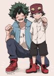  2boys alternate_costume bangs baseball_cap black_pants black_shorts blush boku_no_hero_academia boots breast_pocket breasts clenched_hand closed_eyes clothes_writing collarbone collared_shirt commentary_request dress_shirt facing_viewer freckles green_jacket grey_background hat highres hood hood_down hooded_jacket izumi_kouta jacket male_focus midoriya_izuku multiple_boys nakamu_405 open_mouth pants pocket red_footwear red_headwear scar_on_arm shirt shoes short_shorts short_sleeves shorts skirt smile sneakers squatting white_shirt 