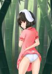 1girl animal_ears ass bamboo bamboo_forest black_hair bunny_ears bunny_tail clothes_lift dress dress_lift flashing forest from_behind hand_to_own_mouth highres inaba_tewi kubure lifted_by_self looking_at_viewer looking_back nature outdoors panties pink_dress red_eyes short_hair short_sleeves smile solo tail thighs touhou underwear 
