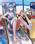  1girl :o absurdres barefoot beach blue_hair blush breasts cleavage coconut crab drink eula_(genshin_impact) feet food fruit full_body genshin_impact hairband highres huge_filesize ice_cream kujuu_(zacu2523) large_breasts lotion ocean open_mouth sock_pull solo strap_pull sundae swimsuit toes watermelon 