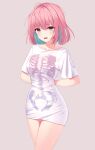  1girl absurdres ahoge blush breasts collarbone detached_sleeves eyebrows_visible_through_hair fang hair_between_eyes highres idolmaster idolmaster_cinderella_girls idolmaster_cinderella_girls_starlight_stage looking_at_viewer medium_breasts moko_(jw7436) pajamas_challenge pink_hair shirt short_hair skeleton_print solo tan_background tearing_up wavy_mouth white_shirt yumemi_riamu 