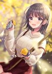  1girl :d absurdres akowazaki aran_sweater autumn autumn_leaves bamboo bamboo_broom bangs between_legs blurry blurry_background blush breasts broom brown_hair collarbone commentary_request day depth_of_field eyebrows_visible_through_hair food ginkgo hair_ornament hairclip highres holding holding_food large_breasts leaf long_sleeves looking_at_viewer maple_leaf medium_breasts medium_hair miniskirt open_mouth original outdoors pleated_skirt pov purple_eyes red_skirt sitting skirt smile solo suspender_skirt suspenders sweater sweet_potato thighs white_sweater 
