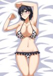  1girl arm_up armpits bed_sheet bikini black_hair blue_eyes blush breasts cleavage collarbone eyebrows_visible_through_hair glasses konori_mii large_breasts looking_at_viewer lying midriff navel on_back polka_dot short_hair solo swimsuit toaru_kagaku_no_railgun toaru_majutsu_no_index zerosu_(take_out) 