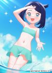  1girl :d arm_up bandeau black_hair cloud commentary cowlick day eyelashes gazing_eye green_eyes green_shorts happy highres knees liko_(pokemon) looking_down midriff navel open_mouth outdoors pokemon pokemon_(anime) pokemon_horizons shorts sky smile solo sparkle teeth upper_teeth_only wading water water_drop watermark web_address 