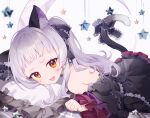  1girl animal_ears bangs blunt_bangs blush bow cat_ears cat_girl cat_tail chain_print detached_sleeves dress dress_bow frilled_dress frills gothic_lolita hair_ribbon hololive layered_dress lolita_fashion long_hair looking_at_viewer lying murasaki_shion on_stomach open_mouth pillow ribbon short_eyebrows sidelocks silver_hair sleeveless sleeveless_dress smile solo star_(symbol) tail tail_bow tail_ornament tugo virtual_youtuber wide_sleeves yellow_eyes 