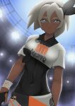  1girl absurdres bangs bea_(pokemon) black_bodysuit black_hairband bodysuit bodysuit_under_clothes bow_hairband breasts closed_mouth collared_shirt commentary_request covered_navel dark-skinned_female dark_skin dynamax_band gloves grey_eyes grey_hair hair_between_eyes hairband highres homomomomon light looking_at_viewer partially_fingerless_gloves pokemon pokemon_(game) pokemon_swsh print_shirt print_shorts shirt short_hair short_sleeves shorts solo stadium 