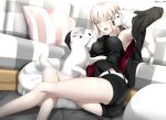  1girl absurdres artoria_pendragon_(fate) ass bangs black_camisole black_jacket black_ribbon black_shorts blonde_hair blush breasts camisole cleavage collarbone couch dog fate/grand_order fate_(series) foo_(pixiv54892036) hair_ribbon highres jacket jet_black_king_of_knights_ver._shinjuku_1999 long_hair long_sleeves looking_at_viewer low_ponytail medium_breasts open_clothes open_jacket open_mouth ribbon saber_alter samoyed_(dog) short_shorts shorts sidelocks sitting thighs yellow_eyes 