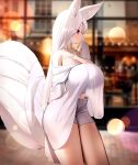  1girl absurdres animal_ear_fluff animal_ears blue_shorts blurry blurry_background breasts cleavage cowboy_shot dress fox_ears fox_girl fox_tail highres huge_breasts long_hair nicorima off-shoulder_dress off_shoulder original red_eyes shirt shorts solo tail white_hair 