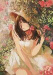  1girl bangs brown_eyes brown_hair collarbone dress flower fly_(marguerite) hair_over_one_eye hand_on_headwear hat highres leaning_forward long_hair original photoshop_(medium) smile solo straw_hat sundress 