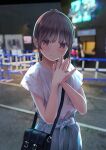  1girl bag bangs blue_skirt blurry blurry_background blush brown_hair chikuwa_(odennabe) closed_mouth handbag hands_together hands_up highres long_hair looking_at_viewer original outdoors palms_together purple_eyes shirt short_sleeves skirt smile solo standing white_shirt 