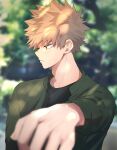  1boy bakugou_katsuki bangs black_shirt blonde_hair blurry blurry_background blurry_foreground blush boku_no_hero_academia closed_mouth depth_of_field foreshortening green_jacket highres jacket looking_to_the_side male_focus noizu_(noi_hr) outstretched_arm shiny shiny_hair shirt short_hair solo spiked_hair 