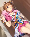  1girl ahoge bangs bottle brown_hair butterfly_hair_ornament butterfly_ornament choker commentary couch drill_hair eyebrows_visible_through_hair grin hair_ornament hair_ribbon holding holding_bottle idol idolmaster idolmaster_million_live! jacket kamille_(vcx68) looking_at_viewer lying medium_hair nouvelle_tricolor_(idolmaster) on_back on_couch one_eye_closed pillow pink_choker pink_shorts polka_dot polka_dot_shorts purple_eyes ribbon sash short_shorts short_sleeves shorts side_drill sidelocks smile solo sweat v water_bottle white_jacket white_ribbon wrist_cuffs yokoyama_nao 