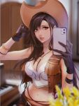  1girl absurdres bangs belt belt_buckle black_gloves blurry breasts brown_hair brown_headwear buckle cellphone commentary cowboy_hat depth_of_field english_commentary final_fantasy final_fantasy_vii gloves hat highres holding holding_phone instrument large_breasts long_hair midriff navel open_mouth phone piano piano_keys red_eyes sleeveless smartphone solo spykeee1945 swept_bangs tifa_lockhart twitter_username upper_body watermark web_address younger 