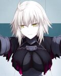  1girl ahoge blonde_hair breasts capelet chain fate/grand_order fate_(series) hair_between_eyes hasebe_akira highres jeanne_d&#039;arc_(alter)_(fate) jeanne_d&#039;arc_(fate)_(all) looking_to_the_side short_hair solo torn_capelet upper_body wall_slam yellow_eyes 