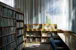  blinds book bookshelf chair commentary_request hankachi_(okayama012) highres indoors interior library light_particles light_rays no_humans original realistic reflection room scenery shelf sunbeam sunlight table tree window 