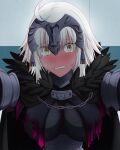  1girl ahoge black_cape blonde_hair blush breasts cape chain clenched_teeth embarrassed fate/grand_order fate_(series) feather_trim full-face_blush hasebe_akira highres jeanne_d&#039;arc_(alter)_(fate) jeanne_d&#039;arc_(fate)_(all) looking_at_viewer medium_breasts solo sweatdrop tearing_up teeth wall_slam yellow_eyes 