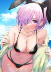  1girl animal_ears bangs beach bikini black_bikini blue_sky blush breasts cloud collarbone fake_animal_ears fate/grand_order fate_(series) hair_over_one_eye herigaru_(fvgyvr000) highres large_breasts looking_at_viewer mash_kyrielight ocean playboy_bunny purple_eyes purple_hair rabbit_ears short_hair sky solo swimsuit undressing 