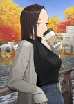  1girl autumn black_sweater blue_sky breasts brown_eyes brown_hair commentary cup day drinking forehead ganbare_douki-chan grey_jacket highres holding holding_cup jacket jewelry lake long_hair looking_away medium_breasts necklace outdoors senpai-san_(douki-chan) sky solo sweater water yomu_(sgt_epper) younger 