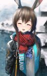  1girl :d absurdres amiya_(arknights) animal_ear_fluff animal_ears arknights arms_behind_back ascot black_coat blue_neckwear blurry blurry_background blush brown_hair closed_eyes clothes_writing coat depth_of_field facing_viewer highres open_clothes open_coat open_mouth rabbit_ears red_scarf scarf short_hair_with_long_locks sidelocks signature smile solo upper_body welt_(kinsei_koutenkyoku) 