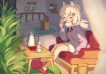  1girl absurdres alpaca_ears alpaca_girl alpaca_suri_(kemono_friends) alpaca_tail alternate_costume animal_ears bare_legs blush closed_eyes commentary_request couch cup eyebrows_visible_through_hair food fur_collar hair_bun hair_ornament highres japari_symbol kemono_friends long_sleeves neck_ribbon noamem pocky purple_sweater red_footwear red_neckwear ribbon short_hair short_shorts shorts sitting slippers solo sweater tail tea teacup teapot white_fur white_hair white_shorts 