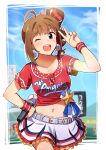  1girl ;d ahoge bangs baseball_earrings baseball_jersey belt blue_sky blurry blurry_background bow brown_hair cheerleader commentary cowboy_shot day depth_of_field drill_hair earrings eyebrows_visible_through_hair frilled_skirt frills grey_belt hair_bow hand_on_hip holding holding_microphone idolmaster idolmaster_million_live! jewelry kamille_(vcx68) long_hair looking_at_viewer medium_hair microphone miniskirt navel one_eye_closed open_mouth outdoors outside_border pleated_skirt purple_eyes red_bow red_shirt shirt short_sleeves side_drill side_ponytail sidelocks skirt sky smile solo standing tied_shirt white_skirt yokoyama_nao 