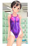  1girl absurdres black_hair brown_eyes cameltoe clothes_writing collarbone commentary_request competition_swimsuit contrapposto covered_navel cowboy_shot flat_chest groin highres locker logo looking_at_viewer multicolored_clothes multicolored_swimsuit one-piece_swimsuit one-piece_tan original purple_swimsuit short_hair solo standing swimsuit takafumi tan tanlines 