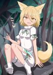  1girl animal_ears bangs blonde_hair chups commentary eyebrows_visible_through_hair fang forest fox_ears fox_tail full_body hair_between_eyes highres holding holding_test_tube kudamaki_tsukasa looking_at_viewer nature open_mouth outdoors romper short_hair short_sleeves signature sitting socks solo tail test_tube touhou white_legwear yellow_eyes 
