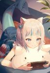  1girl animal_ear_fluff bag bangs blue_dress blue_eyes blue_hair blunt_bangs blush closed_mouth commentary dress fish_tail gawr_gura hair_ornament highres hololive hololive_english indoors looking_at_object multicolored_hair munape nintendo_switch plant playing_games shark_tail side_ponytail silver_hair smile solo streaked_hair tail virtual_youtuber 