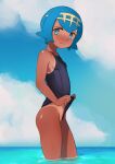  1girl bangs blue_eyes blue_hair breasts bright_pupils cloud commentary covered_nipples dark_skin day freckles from_side hairband highres lana_(pokemon) looking_at_viewer no_sclera one-piece_swimsuit outdoors panapana_(pixiv_12562150) parted_lips pokemon pokemon_(game) pokemon_sm short_hair sky small_breasts smile solo swimsuit tan tanlines wading water white_pupils yellow_hairband 