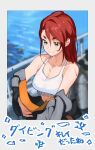  1girl animal blurry blurry_foreground breasts cleavage closed_mouth collarbone commentary dripping fish gochiwa green_eyes hair_between_eyes long_hair original red_hair scuba scuba_gear scuba_tank silhouette smile solo symbol-only_commentary upper_body water wet zipper 