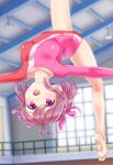  1girl ahoge athletic_leotard backflip barefoot breasts feet gymnastics highres indoors jumping leaning_back leg_up legs leotard long_sleeves maboroshi_dandy midair open_mouth original outstretched_arms pink_eyes pink_hair pink_leotard red_leotard rhythmic_gymnastics ribbon short_hair smile soles solo somersault thighs toes two-tone_leotard two_side_up upside-down 