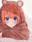  1girl :o animal_hood ayama_nano bangs bear_hood bed bed_sheet blue_eyes blush commentary eyebrows_behind_hair face go-toubun_no_hanayome highres hood hood_up hoodie long_sleeves looking_at_viewer medium_hair nakano_yotsuba orange_hair pajamas parted_lips sanpaku sidelocks solo under_covers white_background wrinkled_fabric 