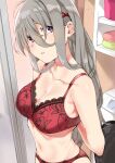  1girl arms_behind_back bra breasts cleavage commentary_request grey_hair hair_between_eyes hair_ornament hairclip indoors long_hair looking_at_viewer mamedenkyuu_(berun) navel original panties parted_lips purple_eyes red_bra red_panties solo towel underwear underwear_only washing_machine 