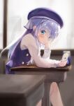  1girl black_headwear blue_eyes blue_hair blush cellphone chair commentary desk eyebrows_visible_through_hair gochuumon_wa_usagi_desu_ka? hair_ornament hat highres holding holding_phone kafuu_chino kafuu_chino&#039;s_school_uniform long_hair long_sleeves looking_at_phone natuna_natu phone school_chair school_desk school_uniform sitting smartphone solo twitter_username window x_hair_ornament 