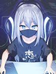  1girl bangs black_shirt blue_eyes chair clothes_writing collarbone commentary_request desk eyebrows_visible_through_hair hair_between_eyes highres long_hair looking_at_viewer mask mimura_zaja mouse_(computer) mouth_mask office_chair on_chair original shirt short_sleeves silver_hair sitting solo translation_request v-shaped_eyebrows very_long_hair 