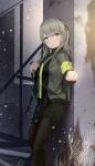  1girl black_legwear black_shirt black_skirt camouflage camouflage_jacket closed_mouth eyebrows_visible_through_hair feet_out_of_frame girls&#039;_frontline green_eyes grey_hair gun h&amp;k_ump hair_ribbon highres jacket long_hair looking_at_viewer open_clothes open_jacket pantyhose ribbon shirt skirt smile solo standing submachine_gun ump40_(girls&#039;_frontline) weapon weapon_on_back wo_you_yibei_jia_wanli 